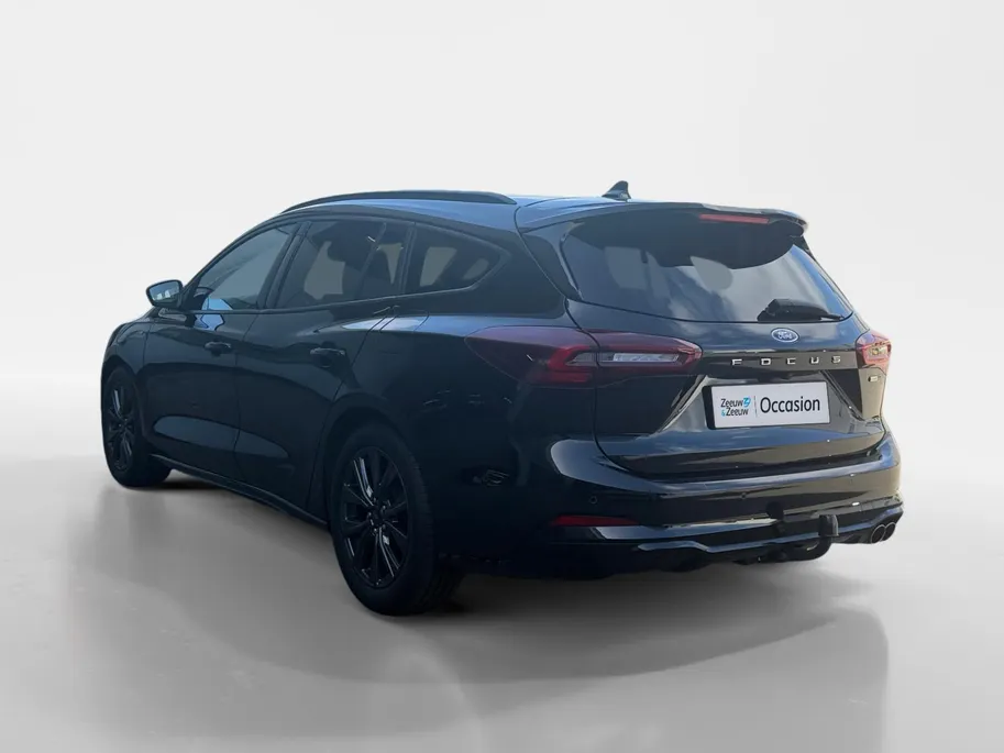 Ford Focus Wagon 1.0 EcoBoost Hybrid ST Line Style | Dealer onderhouden | NL auto | Winter pack | Trekhaak | Navigatie | Apple carplay & Android auto | Parkeersensoren voor en achter | Achteruitrijcamera | Cruise control | Draadloos opladen mobiel | Privacy glas | B