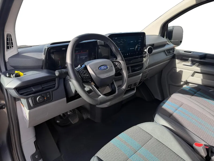 Ford Transit Custom 300 2.0 TDCI L2H1 Sport | Automaat | Adapt. Cruise control | BLIS | Winter pack | Elektr. bestuurdersstoel | Parkeersensoren voor en achter | Achteruitrijcamera | Navigatie | Apple carplay & Android auto | 18' lichtmetalen velgen | Bovag garantie |
