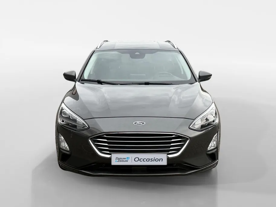 Ford Focus Wagon 1.0 EcoBoost Titanium Business | Trekhaak | HUD | Achteruitrijcamera | Winter Pack | Dodehoek detectie | Elektr. Achterklep | 12 maanden garantie! |