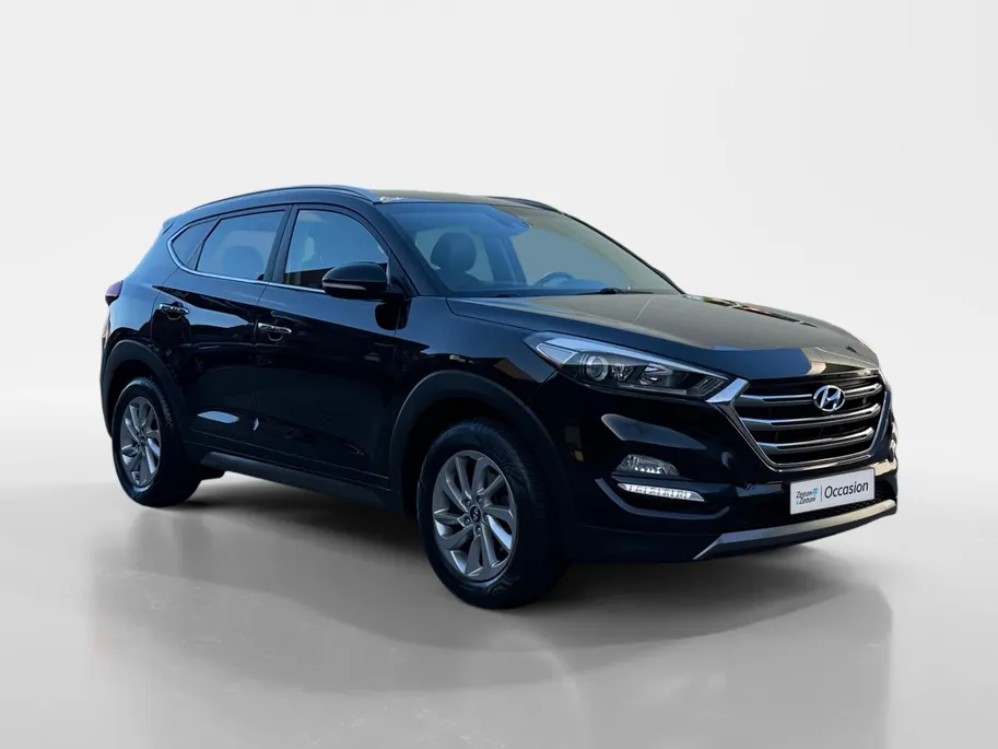 Hyundai Tucson 1.6 GDi Comfort | Elektrisch Verstelbare Stoelen | Navigatie | Bluetooth | Camera | Stoelverwarming | Cruise & Climate Control | Onderhoudshistorie | All Season Banden | 12 Maanden BOVAG Garantie