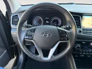 Hyundai Tucson 1.6 GDi Comfort | Elektrisch Verstelbare Stoelen | Navigatie | Bluetooth | Camera | Stoelverwarming | Cruise & Climate Control | Onderhoudshistorie | All Season Banden | 12 Maanden BOVAG Garantie