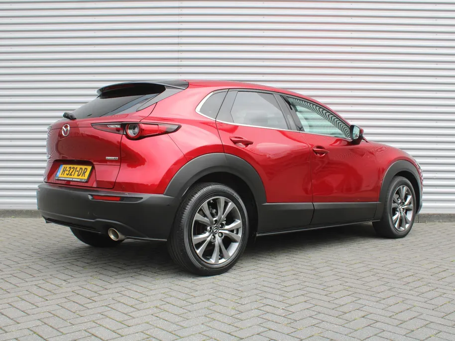 Mazda CX-30 2.0 e-SkyActiv-X M Hybrid Luxury | Trekhaak | Schuifdak | 18' LM | Leer | Elektr. stoelverstelling | Stuur-/stoelverwarming | HUD | 360 Camera | Winterset |