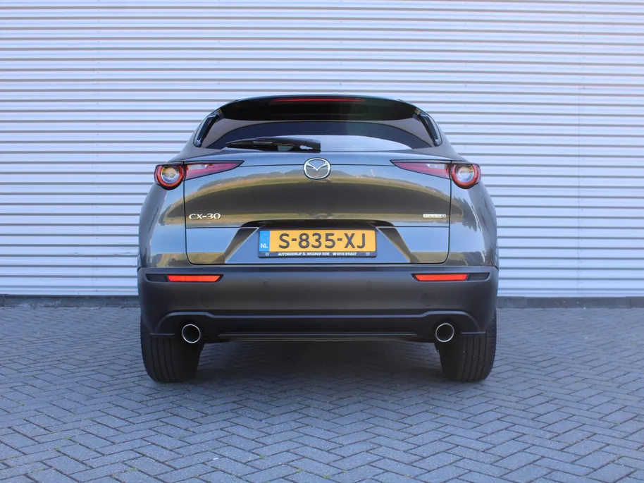 Mazda CX-30 2.0 e-SkyActiv-X M Hybrid Homura | Stoel-/stuurverwarming | Camera | 18' LM | LED | HUD | Dodehoek detectie | Elek. achterklep | Cruise adapt. |