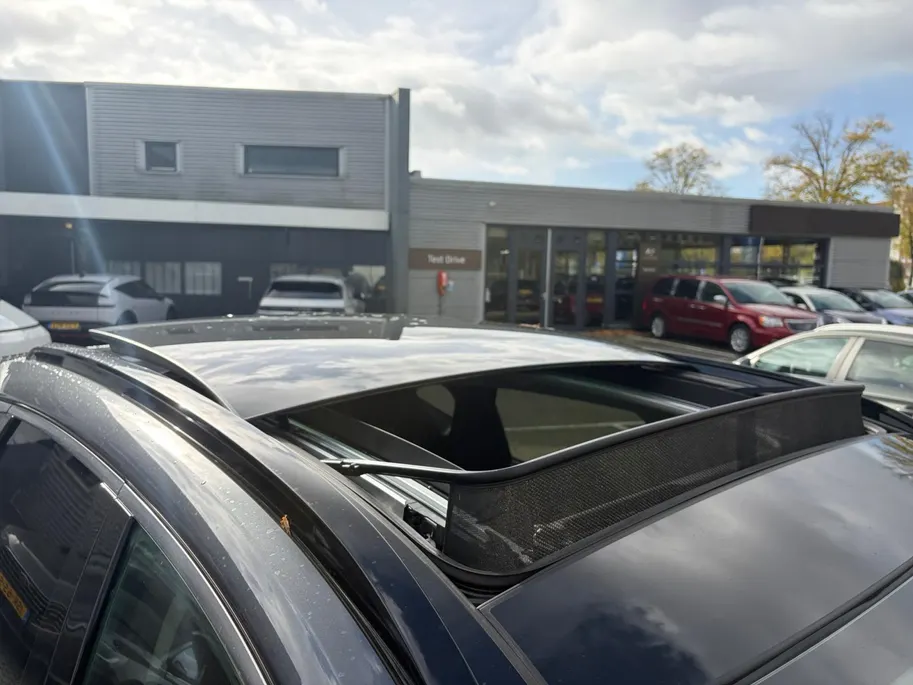 Hyundai Tucson 1.6 T-GDI HEV Premium Sky | Full options! | Elek. stoelverstelling | Schuif- kanteldak | Leder | Stoelverwarming en koeling