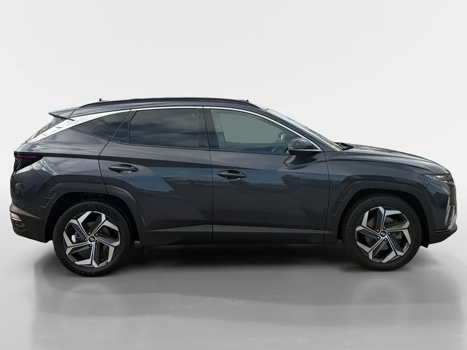 Hyundai Tucson 1.6 T-GDI HEV Premium Sky | Full options! | Elek. stoelverstelling | Schuif- kanteldak | Leder | Stoelverwarming en koeling
