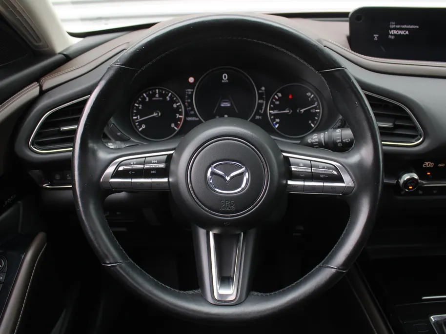 Mazda CX-30 2.0 e-SkyActiv-X M Hybrid Luxury | Trekhaak | Schuifdak | 18' LM | Leer | Elektr. stoelverstelling | Stuur-/stoelverwarming | HUD | 360 Camera | Winterset |