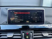 BMW X1 sDrive18i High Executive | Automaat | Head-Up Display | Automatische Achterklep | Panorama Dak | Stoelverwarming | Volledig Lederen Bekleding | Dealer Onderhouden | Camera | 12 Maanden BOVAG Garantie