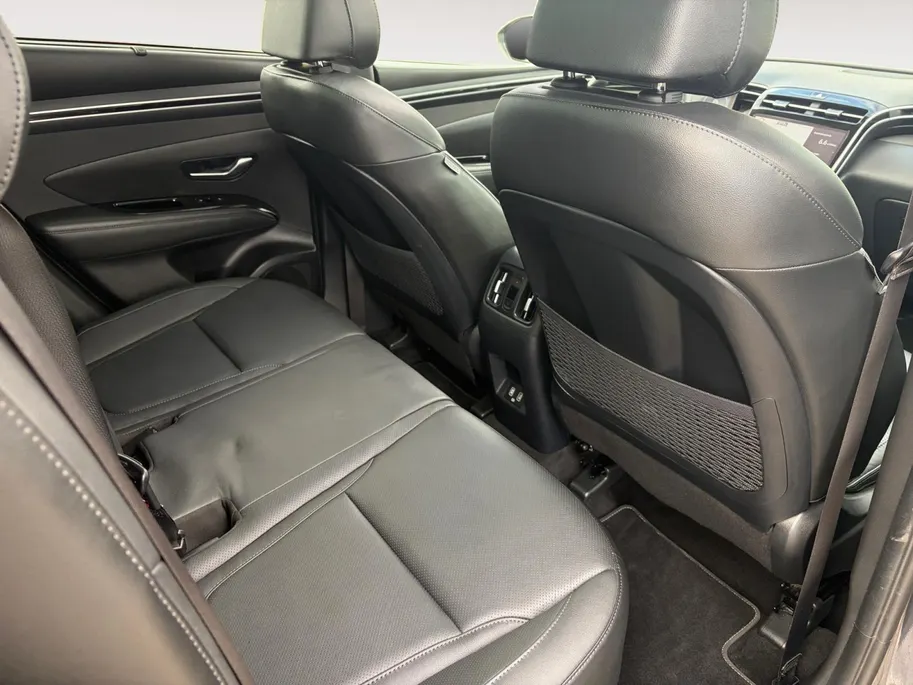 Hyundai Tucson 1.6 T-GDI HEV Premium Sky | Full options! | Elek. stoelverstelling | Schuif- kanteldak | Leder | Stoelverwarming en koeling