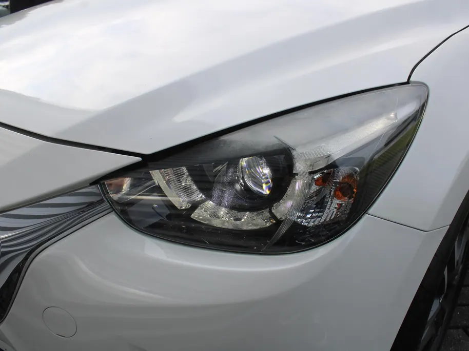 Mazda 2 1.5 Skyactiv-G GT-M | Trekhaak | Camera | Stoelverwarming | 16' LM | Navi | Cruise | Clima | Dodehoek detectie | LED | HUD |