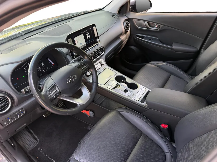Hyundai Kona EV Premium 64 kWh HEAD UP DISPLAY | LEDEREN BEKLEDING | 455 KM ACTIERADIUS | ACC | DODEN HOEK DETECTIE | 12 MAANDEN BOVAG GARANTIE