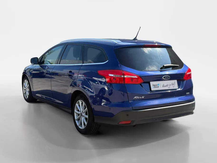 Ford Focus Wagon 1.0 Titanium 125 pk | Airco | Navigatie | LM Velgen | Dealer onderhouden!
