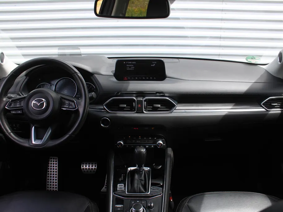 Mazda CX-5 2.0 SkyActiv-G 6AT 165PK Business Luxury | Stuur-/stoelverwarming + ventilatie | Geheugenstoel | 360 Camera | HUD | Leer | 19" LM | Dodehoek detectie | Bose |