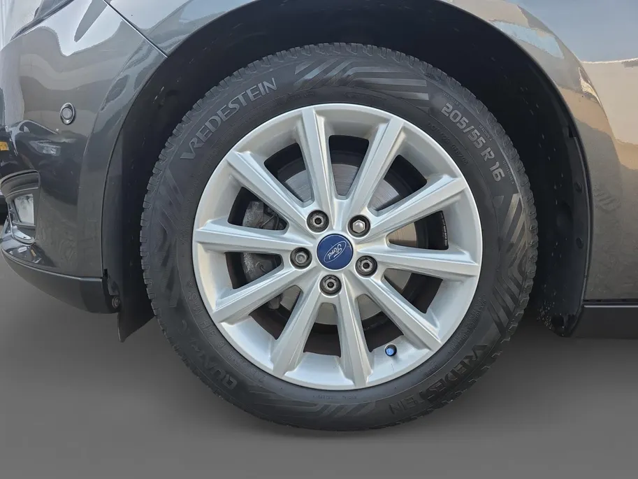 Ford Focus Wagon 1.0 Titanium | Goed onderhouden! | Apple Carplay/Android Auto | Cruise Control | Achteruitrijcamera | Climate Control | Parkeersensoren rondom | 12 maanden garantie! |
