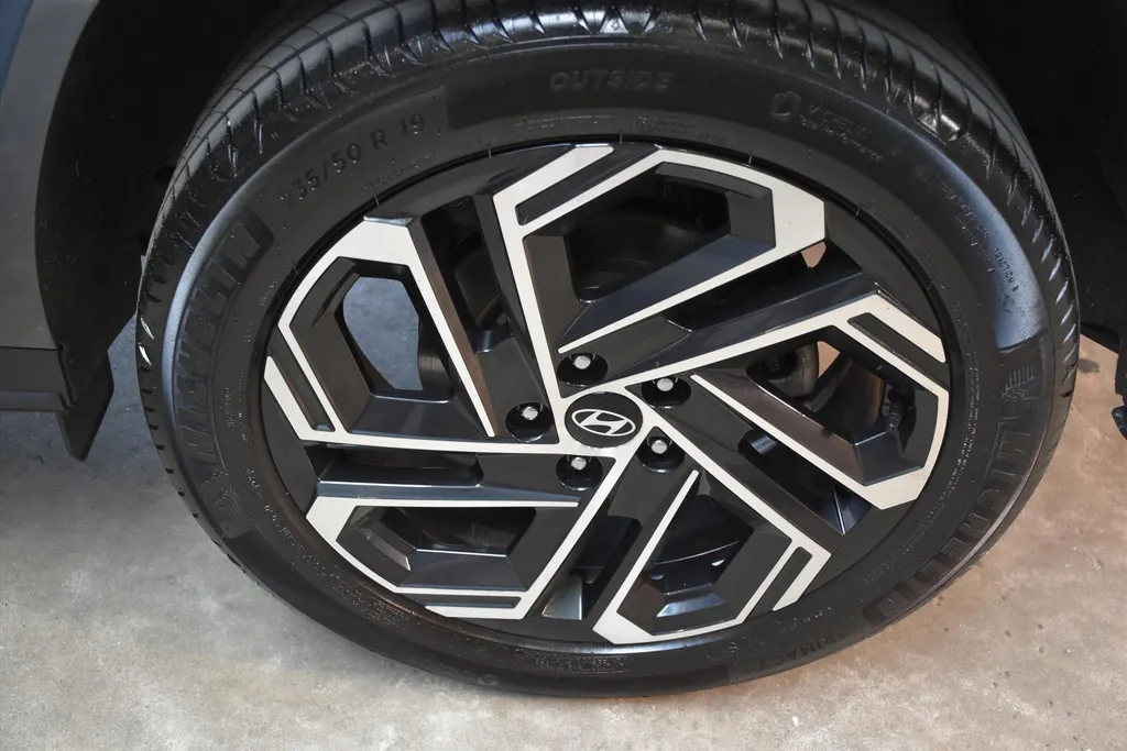 Hyundai Tucson 1.6 T-GDi HEV Aut. Premium Sky |Schuifdak |Beige Leder .