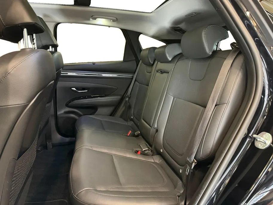 Hyundai Tucson 1.6 T-GDI PHEV Premium Sky 4WD | 66km WLTP elektrisch | Navigatie | Adaptive cruise control | Trekhaak | Apple Carplay & Android Auto | Dode hoek detectie | Draadloze telefoonlader |