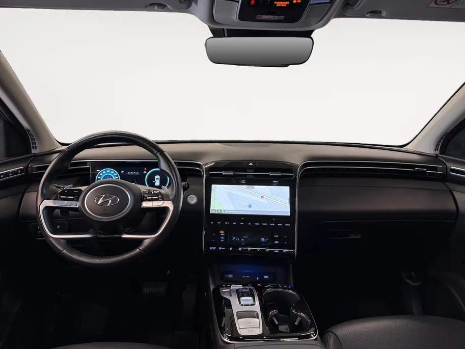 Hyundai Tucson 1.6 T-GDI PHEV Premium Sky 4WD | 66km WLTP elektrisch | Navigatie | Adaptive cruise control | Trekhaak | Apple Carplay & Android Auto | Dode hoek detectie | Draadloze telefoonlader |