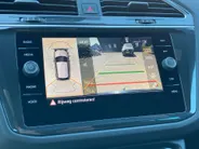 Volkswagen Tiguan 1.4TSIeHybrid/150PK R-Line Business+ · Panoramadak · Leder · Trekhaak · Camera · Apple/Android Car Play