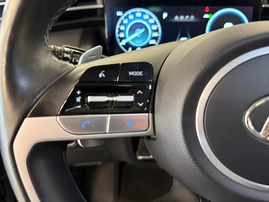 Hyundai Tucson 1.6 T-GDI PHEV Premium Sky 4WD | 66km WLTP elektrisch | Navigatie | Adaptive cruise control | Trekhaak | Apple Carplay & Android Auto | Dode hoek detectie | Draadloze telefoonlader |