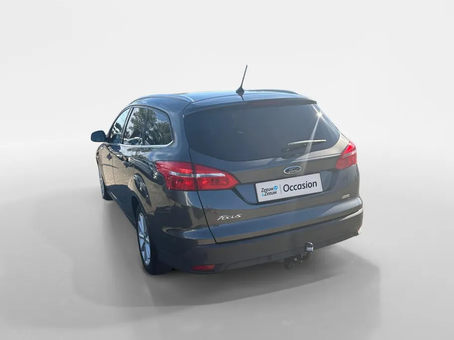 Ford Focus Wagon 1.0 Titanium |Lederen/stof bekleding| Trekhaak| bi-xenon koplampen| keyless entry| 12 maanden Bovag garantie|