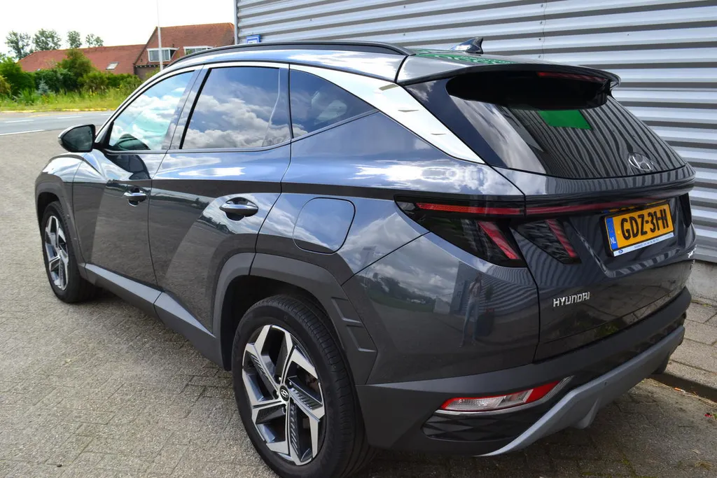 Hyundai Tucson 1.6 HEV PREMIUM|LEER|NAVI|1650KG TREKGEWICHT