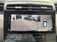 Hyundai Tucson 1.6 T-GDI PHEV Premium Sky 4WD | Zeer compleet | Open dak | Unieke bekleding | Trekhaak | 360 graden camera | Stoel koeling & verwarming |