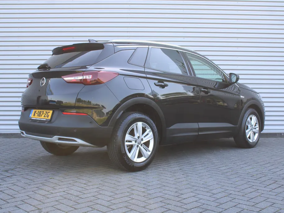Opel Grandland X 1.2 Turbo Business Elegance | Camera | Telefoonlader | Clima  | Dodehoek detectie | Cruise | Navi | LED | 17” LM | Half stof/leer |
