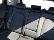 Hyundai Kona EV Premium 64 kWh | LAGE KM STAND! | Leder | Stoel- stuurverwarming | Navi