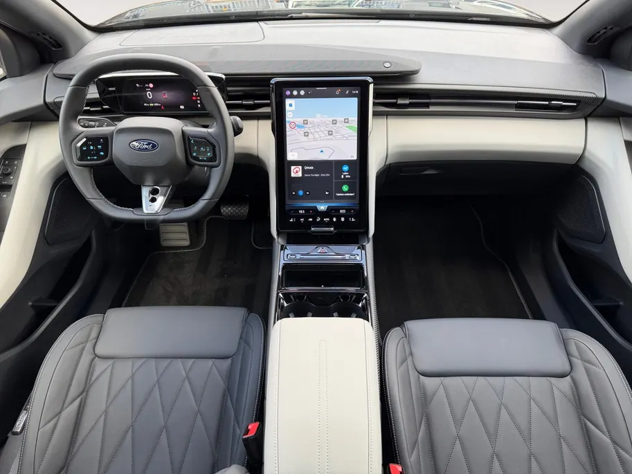 Ford Capri Premium Standard Range RWD 52 kWh | Uit Voorraad Leverbaar | €3.500,- Ready Set Ford Bonus | 374km WLTP Rijbereik | Warmtepomp | Draadloze Apple Carplay & Android Auto | B&O Premium Audio | Verwarmbare Voorstoelen | Adaptieve Cruise Control