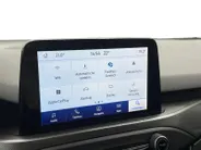 Ford Focus Wagon 1.0 EcoBoost Titanium Business | Trekhaak | HUD | Achteruitrijcamera | Winter Pack | Dodehoek detectie | Elektr. Achterklep | 12 maanden garantie! |