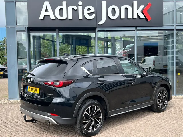 Mazda CX-5 2.0 e-SkyActiv-G M Hybrid 165 Newground AUTOMAAT | TREKHAAK | 360gr. CAMERA | NAVIGATIE | APPLE + ANDROID | HEAD-UP DISPLAY | 19'LM VELGEN | EL.A. KLEP |