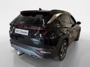 Hyundai Tucson 1.6 T-GDI PHEV Premium Sky 4WD | 66km WLTP elektrisch | Navigatie | Adaptive cruise control | Trekhaak | Apple Carplay & Android Auto | Dode hoek detectie | Draadloze telefoonlader |