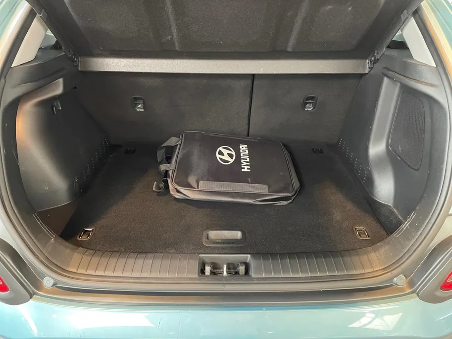 Hyundai Kona EV Fashion 64 kWh | 100% SOH | Warmtepomp | Navigatie | Apple Carplay & Android Auto | Adaptive cruise control | Climate control | Head-up display | Parkeersensoren achter |
