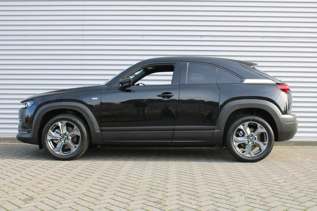Mazda MX-30 e-SkyActiv EV 145PK Advantage Modern 36 kWh | Stoelverwarming | HUD | Dodehoek detectie | Elek. stoelverstelling | LED | 18' LM | Camera |