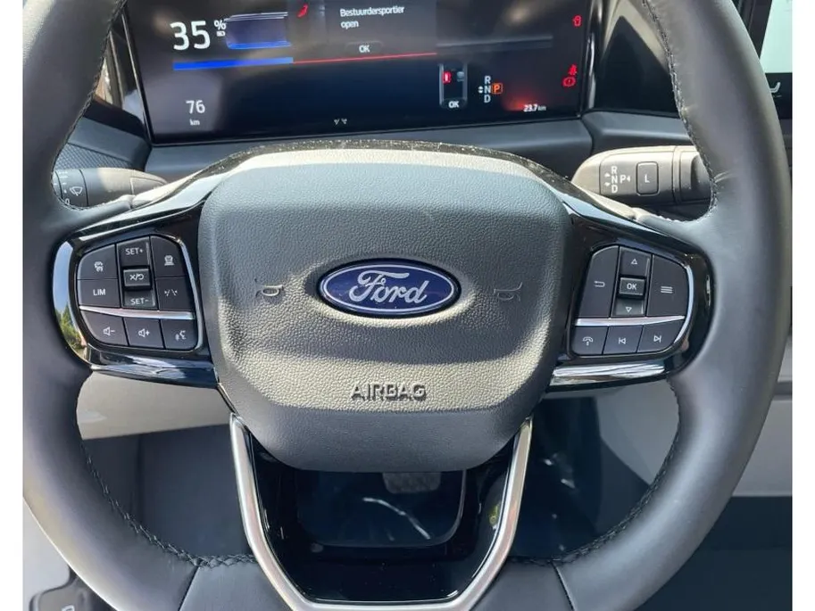 Ford E-Transit Custom 320 L2H1 Limited 71 kWh 218 pk | 0,99% rente op financial lease | Navigatie | 2-zits uitvoering | Inklapbare trekhaak | LM velgen 17' | TE BESTELLEN VOERTUIG