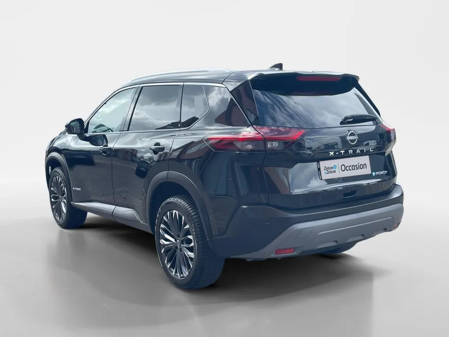 Nissan X-Trail Tekna | Navigatie | Schuif-/ Kanteldak | Stoelverwarming voor & achter | 360 camera | Apple Carplay/ Android Auto | Geheugenfunctie voorstoelen | Elektrische Kofferbak |