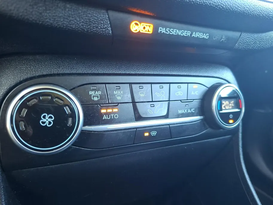 Ford Fiesta 1.0 EcoBoost Titanium | Nieuwe Disitributieriem bij aflevering  | Navigatie | Camera | Adaptieve Cruise Control | Voorruitverwarming | B&O | Climate Control