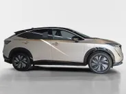 Nissan ARIYA Evolve 66 kWh | 22KW Lader| Afneembare trekhaak| Apple carplpay& Android auto| 360grd Camera| Stoelverwarming en verkoeling| Elektrisch verstelbare stoelen| Luxe bekleding| Dealer onderhouden|