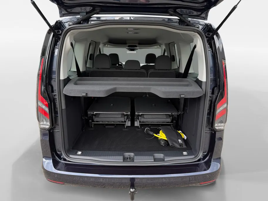 Ford Transit Connect Ford Tourneo Connect PHEV L2 Titanium 7p. | Uit Voorraad Leverbaar | Geel Kenteken | Automaat | Trekhaak | AGR Gecertificeerde Voorstoelen | Achteruitrijcamera | Winter Pakket | Adaptieve Cruise Control