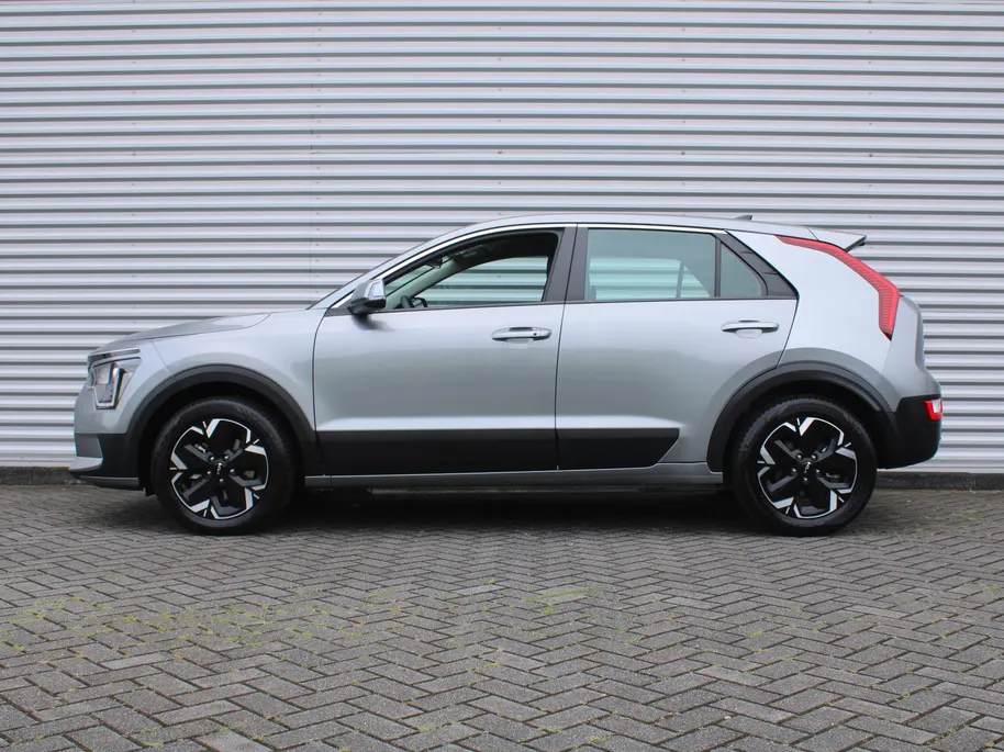Kia Niro EV Light Edition 64.8 kWh | Airco | Cruise | Navi | Camera | PDC | 17' LM | All season banden | 17% bijtelling |