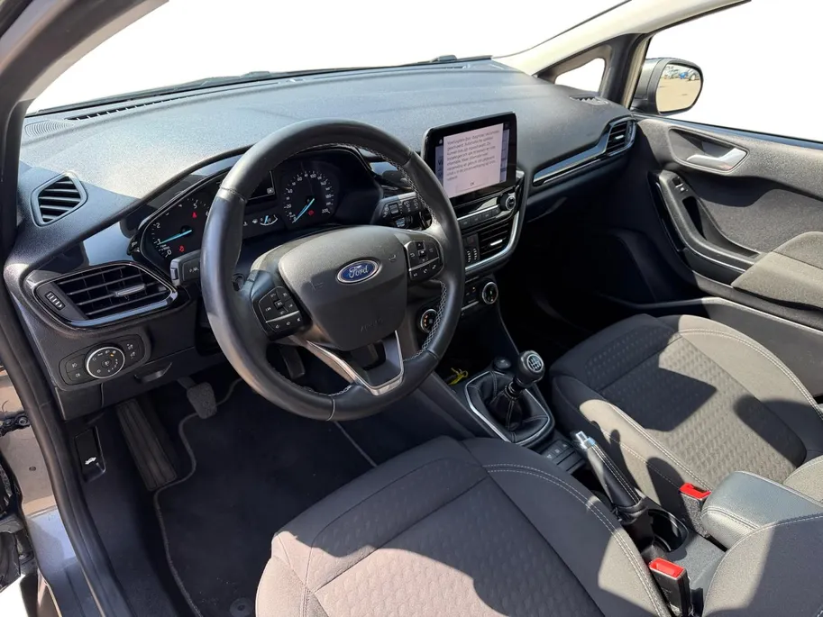 Ford Fiesta 1.0 EcoBoost Titanium | Dealer onderhouden | Winter pack | Parkeersensor achter | Apple carplay & Android auto | Navigatie via carplay | Cruise control | Elektr. inklapbare buitenspiegel | Privacy glas |
