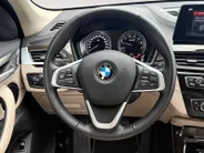 BMW X1 sDrive18i Business Edition Plus | Trekhaak | Leder | Navi | Stoelverwarming | Head-Up Display | Ambient Lighting | NL AUTO | Cruise Control | Climate Control | 12 maanden Bovag garantie |