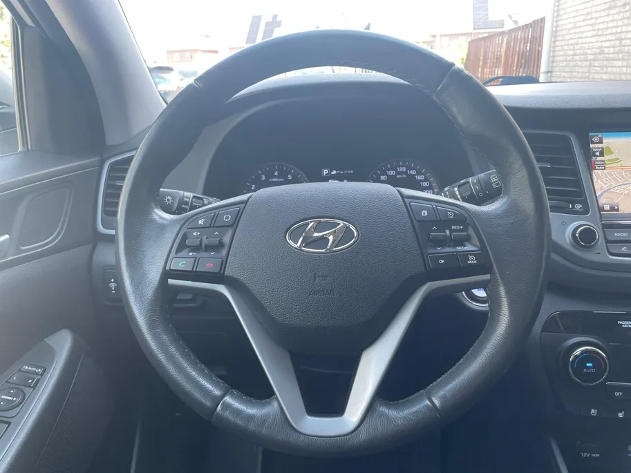 Hyundai Tucson 1.6 T-GDi Premium 4WD | STOEL VERWARMING | SCHUIFKANTELDAK | CAMERA | NAVIGATIE | ELEKTRISCHE STOEL |