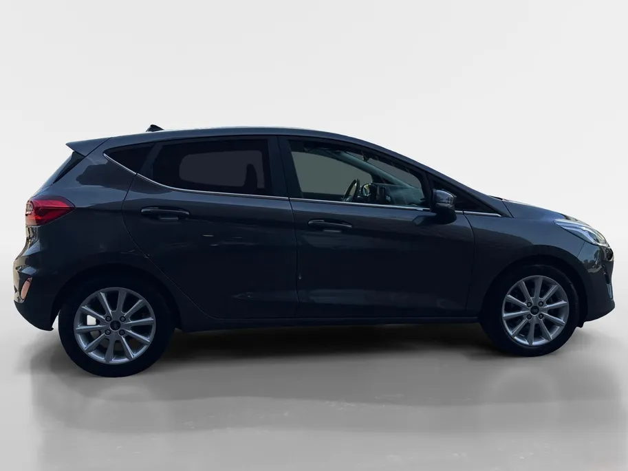 Ford Fiesta 1.0 EcoBoost Titanium X | Winter Pack | Navigatiesysteem | Cruise Control | Draadloos Telefoonlader | Apple Carplay & Android Auto |