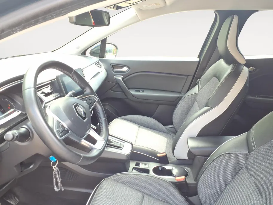 Renault Captur 1.6 E-Tech Hybrid 145 Intens Apple Carplay/Android Auto , electronic climate controle , camera , parkeersensor , lm velgen , navi , cruise , tel , usb.