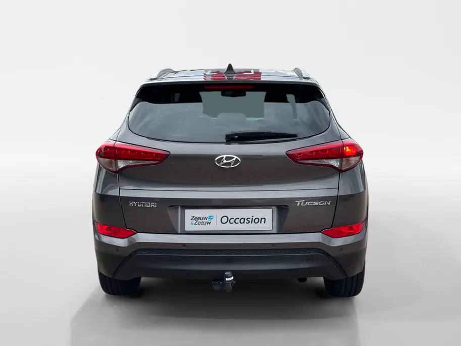 Hyundai Tucson 1.6 GDi Comfort *Navi*Camera*Trekhaak*Dual Climate Control*Cruise Control*Stoelverwarming*LM.Velgen*Zeer nette auto!