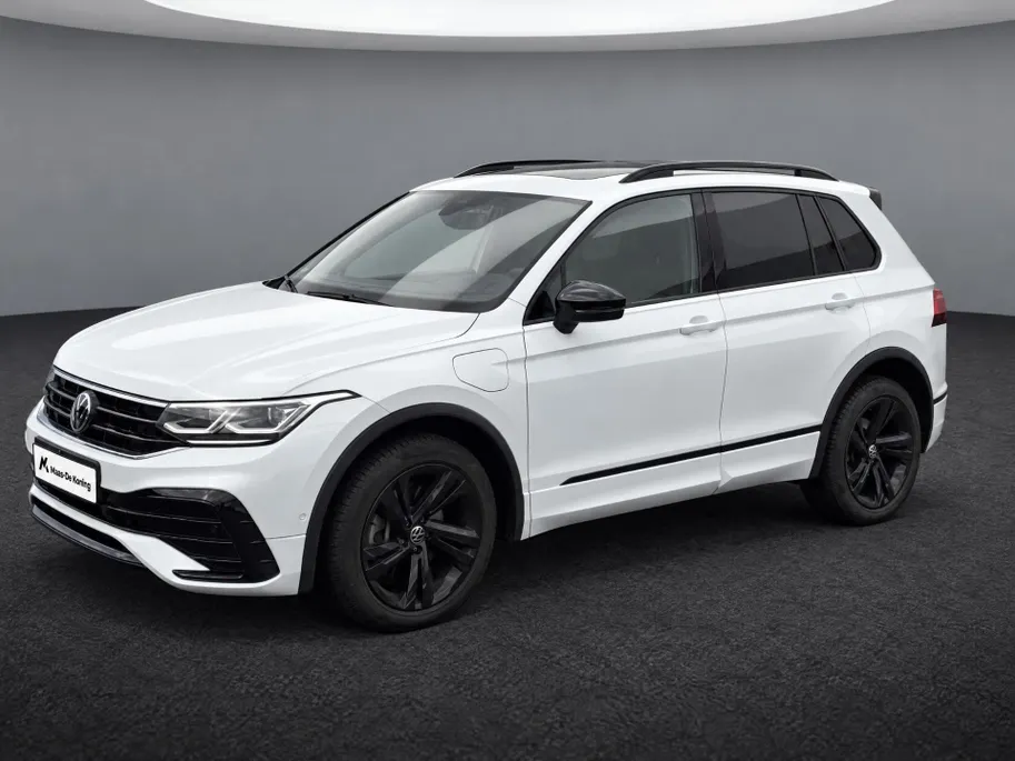 Volkswagen Tiguan 1.4TSIeHybrid 180kW/245PK R-Line Black Style · Panoramadak · Trekhaak · 360°Camera + Parkeersensoren · Stoelverwarming · Garantie t/m 27-07-2027 of 100000km.