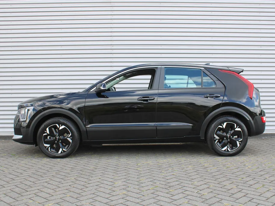 Kia Niro EV Light Edition 64.8 kWh | Camera | Cruise adapt. | Clima | 17' LM | Navi | Keyless | All season banden | 17% bijtelling |