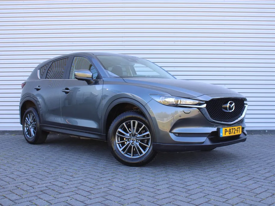 Mazda CX-5 2.0 SkyActiv-G 165 Comfort | Stuur-/stoelverwarming | Navi | Dodehoek detectie | Apple Carplay/Android Auto | Clima | PDC | Cruise | 17' LM | LED |