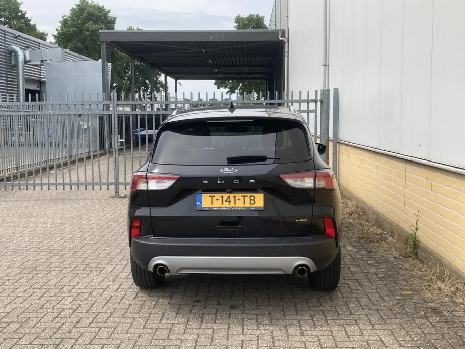 Ford Kuga 2.5 PHEV 225 pk Titanium Winter Pack - Draadloos opladen telefoon Origineel NL auto met weinig km.