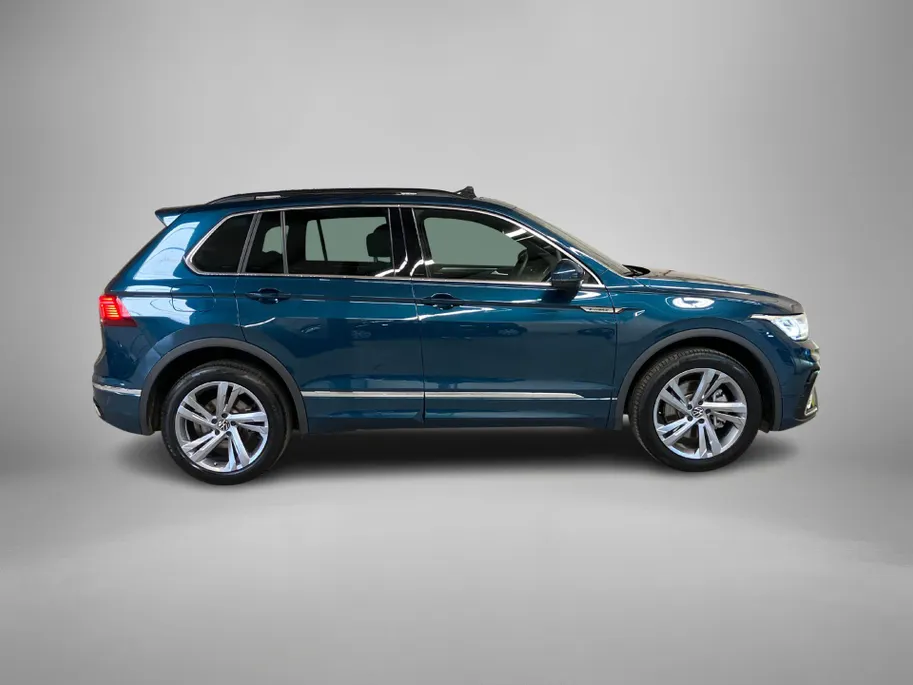 Volkswagen Tiguan 1.4TSIeHybrid 180kW/245PK R-Line DSG · Panoramadak · Trekhaak · 360°Camera + Parkeersensoren · Keyless entry